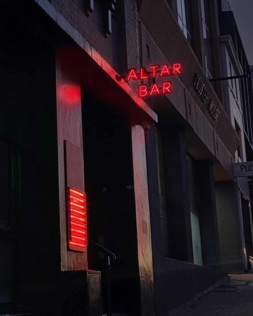 Letter board sign reading 'Altar Bar Opening Party'